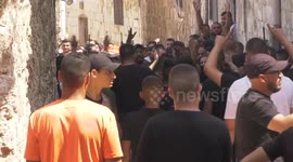 Palestinians carry the body of Mustafa al-Kastouni, 32, who was killed after he was shot by Israeli gunfire in the head during an Israeli military raid in the West Bank city of Jenin