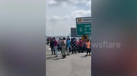 Malaysia plane crash aftermath as 10 people are killed on road near airport