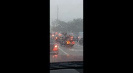 Biker In The Rain