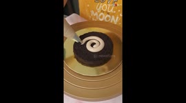 Cake Artist layers up a delicious-looking Almond Praline Cake *Incredible Food Video*