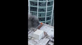 Fire of Moorgate today , man trying to fight the flames