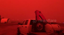 Surreal scenes as wildfire smoke turns Canada's skies red