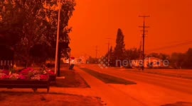 Sky turns apocalyptic red as wildfires ravage western Canada