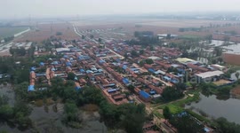 Relocated villagers return home after flood recedes in China's Tianjin