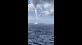 Waterspout Spins By Cruise Ship