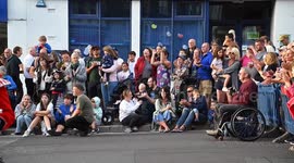 Thousands of spectators turn out to watch the annual carnival procession at Bridport in Dorset with entries from locals young and old.