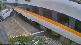 'Drunk driver' crashes into train speeding over level crossing in Taiwan