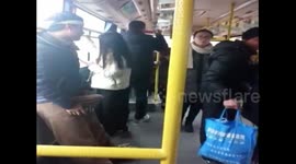 Man puts cucumber down his trousers on bus