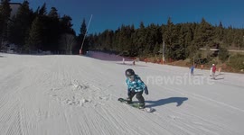 amazing  3 year old kid making snowboarding