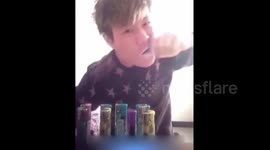 Man chomps cigarette lighters