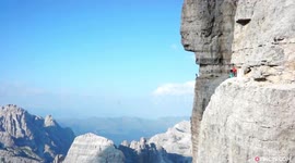 Climbing Italy's Toughest North Face, And Then Jumping Off!