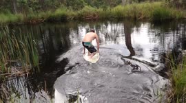 Dam surfing in a canoe