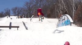 Skier shows off double backflip trick