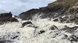 Large sea foam build-up in Cornwall during Storm Jake