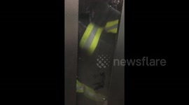 Lift slowly fills with smoke with group trapped inside