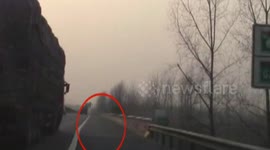 Driver relieves himself in bottle, throws it out the window, nearly hits police car