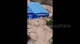 Six workers go missing amid unexpected flood in southern China