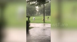 Thunderbolt terrifies lads while they play football in storm