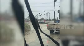 Tropical Storm Hilary: Video shows truck submerged by floodwaters