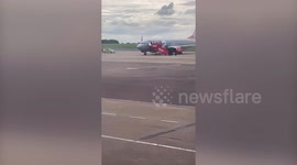 Moment armed police remove man from Jet2 flight after bomb scare