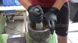 Aspiring chefs compete in stir fry cooking contest in Thailand