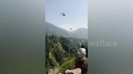 Pakistan cable car rescue team attempts to winch child to safety