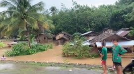 Riverside homes flooded following monsoon storm in the Philippines