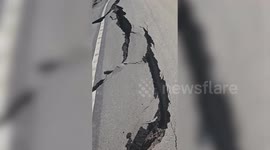 Flooding from Tropical Storm Hilary and quake leave California road completely destroyed