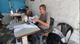 Palestinian tailors sew school uniforms for students in Gaza