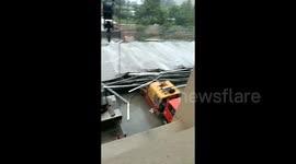 Steel shed collapses amid rain, trapping 12 in eastern China