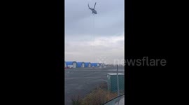 Helicopter on It's Way to Extinguish Wildfires in Yellowknife, Canada