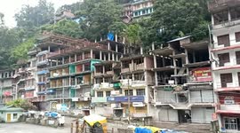 Multi-storey buildings collapse after landslide hits village in northern India