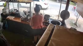 Naughty toddler grabs steering wheel causing mum's car to crash into shop