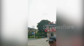 Black ring hovering in the sky baffles residents in China