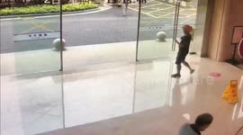 Deliveryman smashes glass door when he walks into it as it closes
