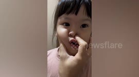 Mum helps remove tiny pinball stuck in daughter's nose in Taiwan