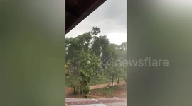Storm tears roof off resident's garage in northern Thailand