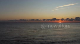The sun rises over a fisherman in Bali, Indonesia - 18 August 2023