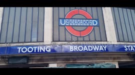 Anti-ULEZ protesters gather outside Tooting Broadway Station days before the ULEZ is meant to come into effect