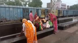 A Women born baby girl on the railway station in Northern India