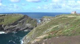 Tintagel New Bridge today 26th August 2023, a fantastic day and loads of people are going over the bridge