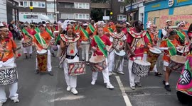 Performers and participants during the Children's Parade on Family Day at the Notting Hill Carnival in London