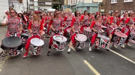 Performers and participants during the Notting Hill Carnival Grand Parade in London
