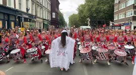 Colourful costumes, drummers and dancers as the Notting Hill Carnival parade kicks off on Day 2