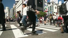 Multi lens fixed shooting of pedestrians crossing the road.