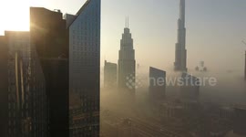 Aerial photography of Dubai's day, night, and night scenes.