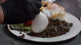 Thai food chefs compete in stir fry cooking contests in Bangkok