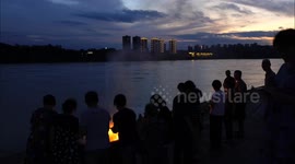 People Burn Incense And Paper To Offer Sacrifices to Their Ancestors in Yichang, China
