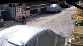 Motorcycle delivery rider clotheslined by cable hanging across street