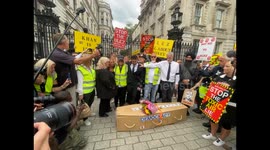 Protesters have 'funeral for democracy' outside Downing Street as ULEZ becomes law